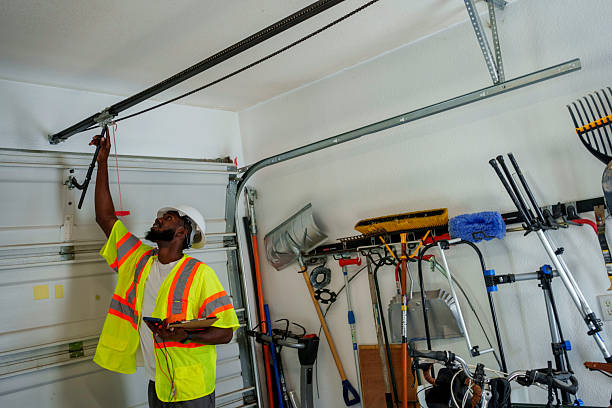 Professional Garage Door Panel Replacement technician working in Mounds View, MN
